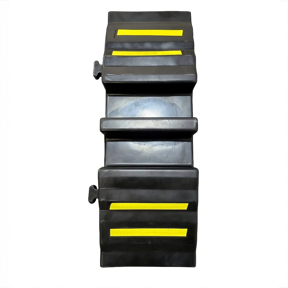 20250826_1419_Black-Ramp-on-White_remix_01k3jrzvwgfjgswx76c6qdw1sh-1000x1000.jpg Rubber Hose Ramp 860mm – Heavy Duty Fire Hose Protector Cable Ramp - Image 1